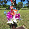 &ldquo;Gone from sight, but not our hearts&rdquo;

An arrangement of assorted artificial flowers