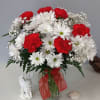 Our Young Designer, arranged these Red Carnations, White Daisies, with loving care