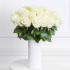 - 12 (Regular), 24 (Deluxe) or 36 (Premium) white roses
- Stems are