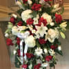 BEAUTIFUL BLOOMS. FEATURING RED ROSES AND WHITE LILIES.
SITS ON A 5 FOOT