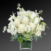 All-white calla lilies and roses accompany the floral scent of stock flowers.