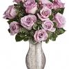 A sparkling mercury glass vase lends a feeling of vintage romance to