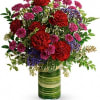Rich and radiant, this vivid mix of jewel-toned blooms is wrapped with