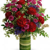 Rich and radiant, this vivid mix of jewel-toned blooms is wrapped with
