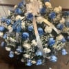 Powder blue and white casket spray