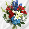 A colorful tribute for someone special, this brilliant arrangement of red, white