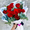 Presenting our classic one-dozen-roses bouquet, a timeless symbol of love and sophistication.