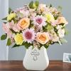 Our serene pastel arrangement is a lovely way to honor someone special.