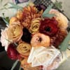 small bouquet with roses, and other seasonal fall flowers. 
