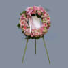 This easel wreath consists of all pinks to add a little color