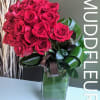 Ditch the grocery store flowers and send a modern arrangement of red