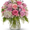 This softly elegant gesture of condolence and affection honoring the memory of