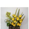 Gorgeous roses &amp; cymbidium orchids with exotic greenery stands tall in a
