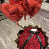 100 Red Roses , balloons and ribbon makes this Ramo Buchon one