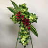 Stunningly simple, this lovely floral cross is a beautiful addition to the