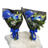 Roses and a hat for him 
Let us know if you would