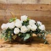 This ivory bohemian-style arrangement is elegant and graceful for any occasion. we