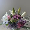 Beautiful  white lilies, mixed with pink roses and lavender astromeria