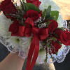 Heart pillow. Solid white carnation with spray of red roses, filler flower