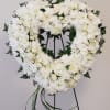 An all white tribute, this heart shaped easel shows your everlasting love.