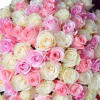 100 beautiful mixed pink and white roses, designed with a modern flare.