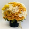 A blend of yellow and white, roses &amp; tulips.