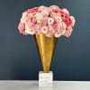 A mind-blowing floral design of one-of-a-kind specialty flowers layered round and neatly