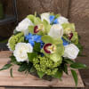A fresh and clean look, white roses, blue and green hydrangeas, green