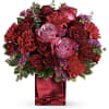 Pure passion. Bedazzle your beloved with luscious red and lavender roses in