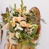 Introducing our exquisite hand-tied flower arrangement, resonating with monochromatic peach vibes! With