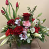 Mixture of red and white seasonal flowers
