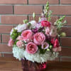 Beautiful Pink and white ranunculus, white hydrangeas, roses, fragrant stock and purple