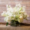 FRESH SOPHISTICATED ASSORTMENT OF WHITE SWEET PEAS, WHITE HYDRANGEAS, WHITE LILAC, WHITE
