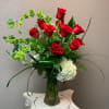 A new twist on a classic, timeless dozen red roses, with white