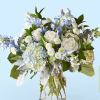 Let this uplifting arrangement be reminders of the clear skies ahead. Capturing
