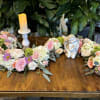 A beautiful collection of garden flowers shaped to accentuate your loved one&#039;s