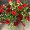 Treat your love to a dozen premium red roses