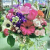 A beauty fresh arrangement of roses, gerbera daisies, stock, mini carnations and