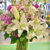 Premium roses, beautiful lilies, snapdragon, lush stock, alstroemeria and gerbera daisies in