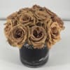 A exquisite collection of a dozen brown toned roses arranged in timeless