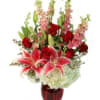 Stargazer Lillies!  Red roses, pink larkspur and white hydrangeas will make