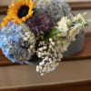 Designers Choice of Fresh Cut Florals placed in Blue Cradle Gift Box