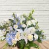 A luxe white, creams, and light blue low &amp; full centerpiece style