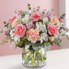 We&#039;ve gathered a lush mix of blooms in soft shade of pink