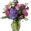 Almost &ldquo;electric&rdquo;!, this traditional vase arrangement is perfect for a gardener or
