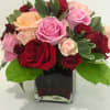 Surprise her with roses in four gorgeous shades of love artistically arranged
