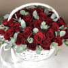 The ultimate in luxury. Red roses are gathered in a basket, crafted