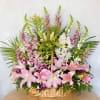 Be delighted as you are forever loved! This basket of pink lilies