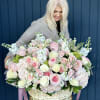 Beautiful flower arrangement with different types of roses and hydrangea and different