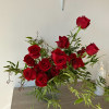 Modernly arranged roses and greenery 